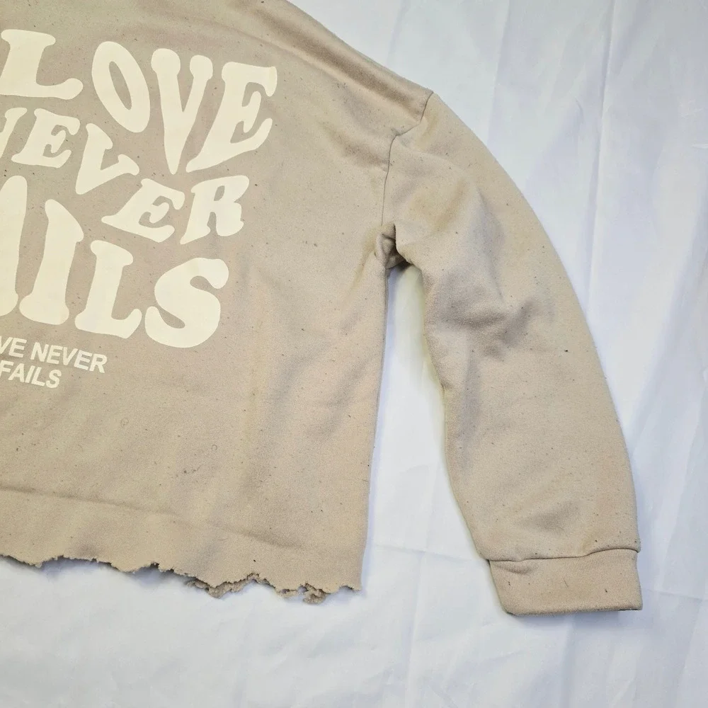 Men's Love Never Fails Fleece Hoodie Size M Beige Distressed Raw Hem T3
